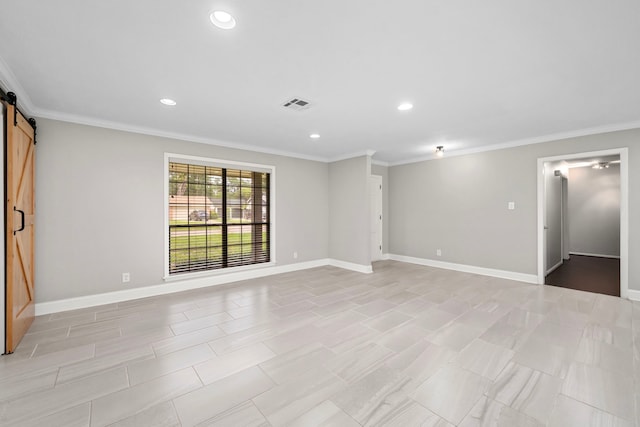 10139 Knoboak Dr, Houston, TX 77080 - unfurnished room featuring a barn door, ornamental molding, recessed lighting, and baseboards
