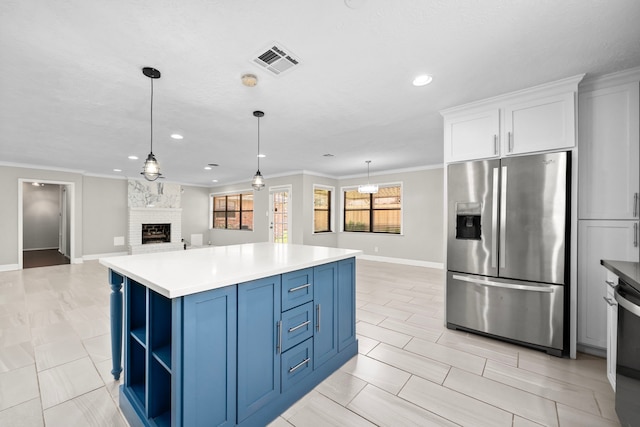 10139 Knoboak Dr, Houston, TX 77080 - kitchen featuring stainless steel refrigerator with ice dispenser, blue cabinets, baseboards, a brick fireplace, and open floor plan