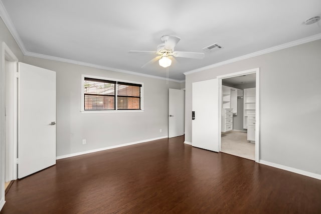10139 Knoboak Dr, Houston, TX 77080 - unfurnished bedroom with wood finished floors, crown molding, baseboards, and a ceiling fan