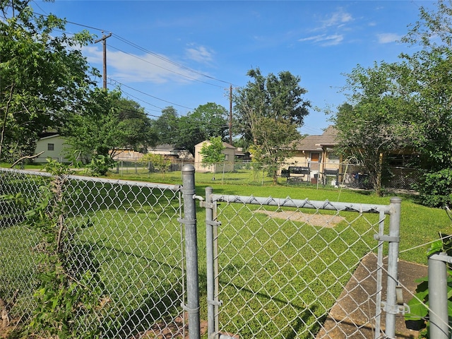 2219 8th St, Galena Park, TX 77547 - view of yard featuring a gate