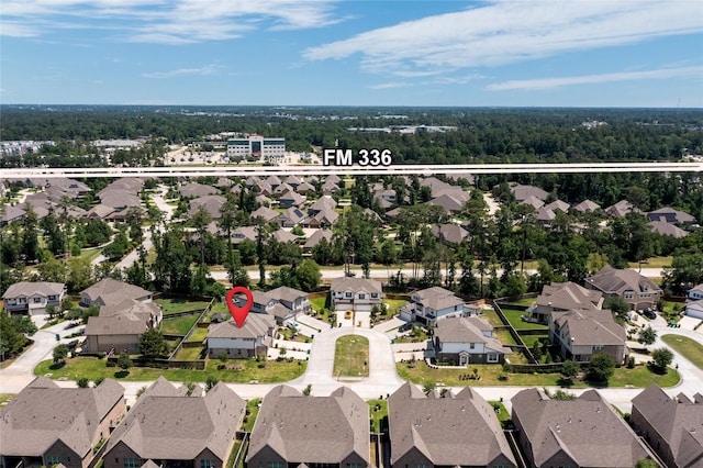 103 Skyshine Ct, Conroe, TX 77304 - aerial perspective of suburban area featuring property parcel outlined