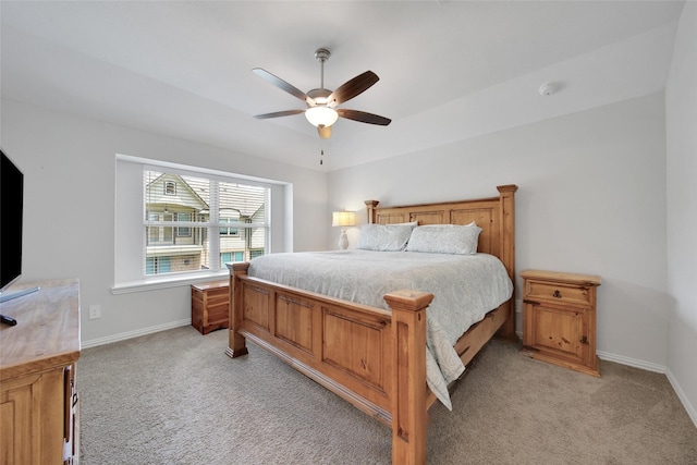 103 Skyshine Ct, Conroe, TX 77304 - bedroom featuring light carpet, baseboards, and ceiling fan