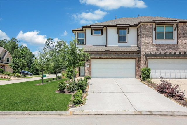 103 Skyshine Ct, Conroe, TX 77304 - view of front of home featuring stucco siding, a front yard, a garage, and brick siding
