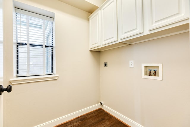 458 Mariners Dr, Kemah, TX 77565 - laundry area featuring hookup for an electric dryer, hookup for a washing machine, baseboards, cabinet space, and dark wood-style floors