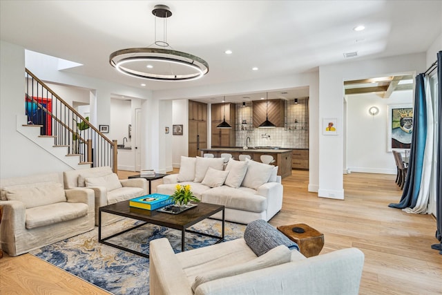 2017 W 14th St Unit A, Houston, TX 77008 - living area with light wood-style floors, baseboards, stairs, and recessed lighting