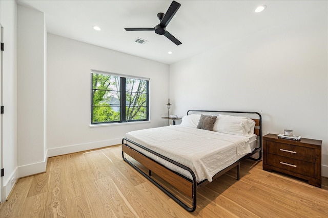 2017 W 14th St Unit A, Houston, TX 77008 - bedroom featuring light wood-type flooring, recessed lighting, baseboards, and ceiling fan