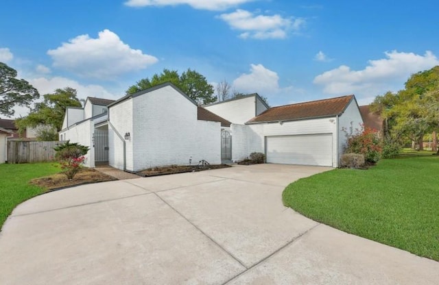 7607 Bankside Dr, Houston, TX 77071 - view of front of property featuring concrete driveway and a garage