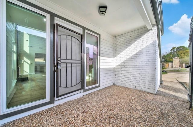 7607 Bankside Dr, Houston, TX 77071 - view of exterior entry featuring brick siding