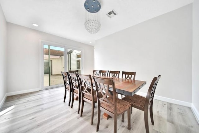 7607 Bankside Dr, Houston, TX 77071 - dining area featuring baseboards, light wood-type flooring, a chandelier, and recessed lighting