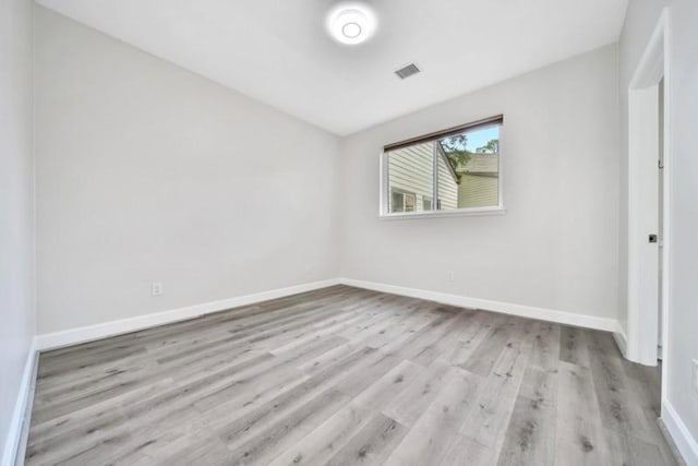 7607 Bankside Dr, Houston, TX 77071 - unfurnished bedroom featuring wood finished floors and baseboards