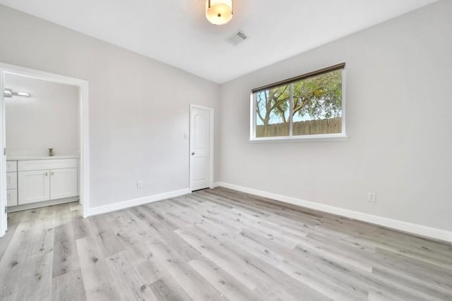 7607 Bankside Dr, Houston, TX 77071 - spare room with light wood-style floors and baseboards