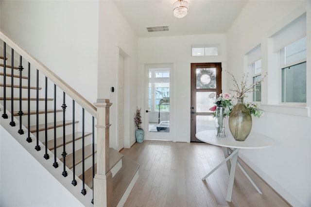 3124 Somerset Levens Ln, Houston, TX 77055 - entryway featuring hardwood / wood-style floors and stairs