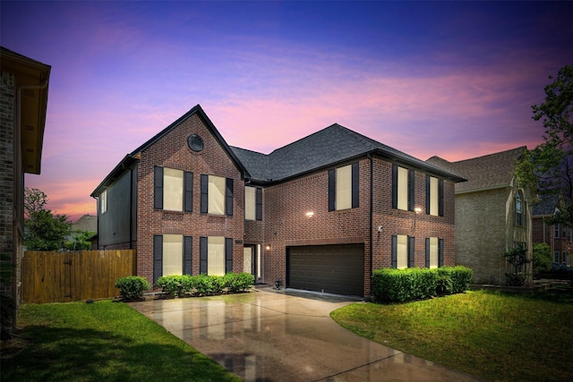 5702 W Vistaglen Loop, Houston, TX 77084 - view of front of home featuring driveway, a garage, and brick siding