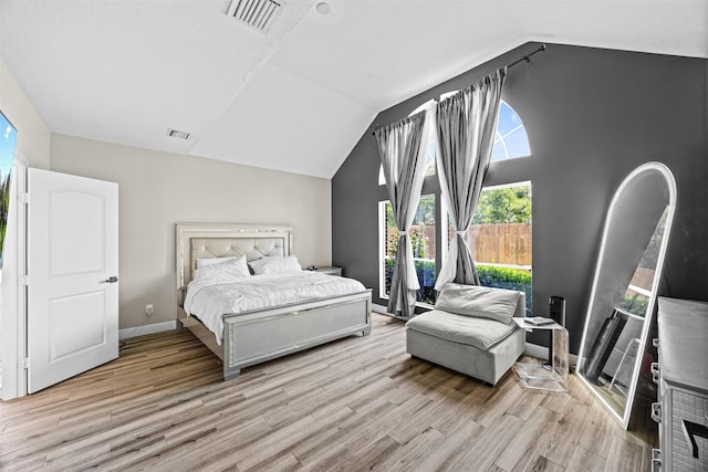 5702 W Vistaglen Loop, Houston, TX 77084 - bedroom featuring vaulted ceiling, light wood-style flooring, and baseboards