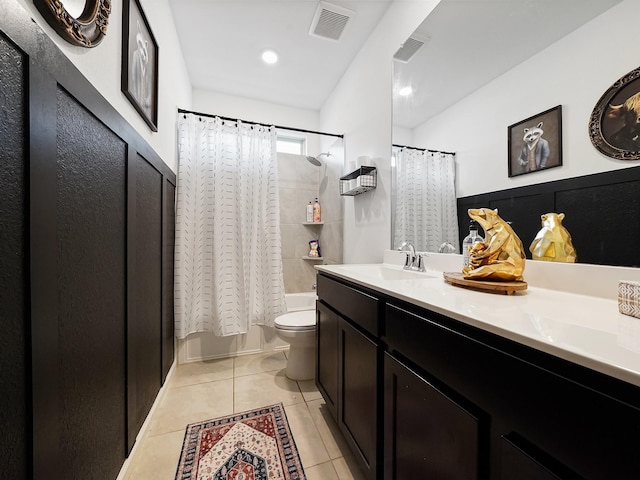 18925 Lazzaro Springs Dr, New Caney, TX 77357 - full bath with toilet, shower / bath combination with curtain, tile patterned flooring, vanity, and recessed lighting