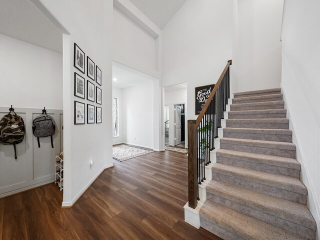 18925 Lazzaro Springs Dr, New Caney, TX 77357 - entryway with wood finished floors and stairway