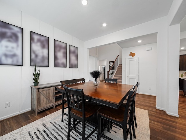18925 Lazzaro Springs Dr, New Caney, TX 77357 - dining room with stairway, dark wood-style flooring, recessed lighting, and baseboards