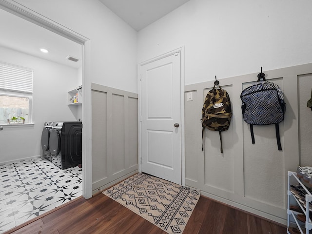 18925 Lazzaro Springs Dr, New Caney, TX 77357 - mudroom with washer and dryer and wood finished floors