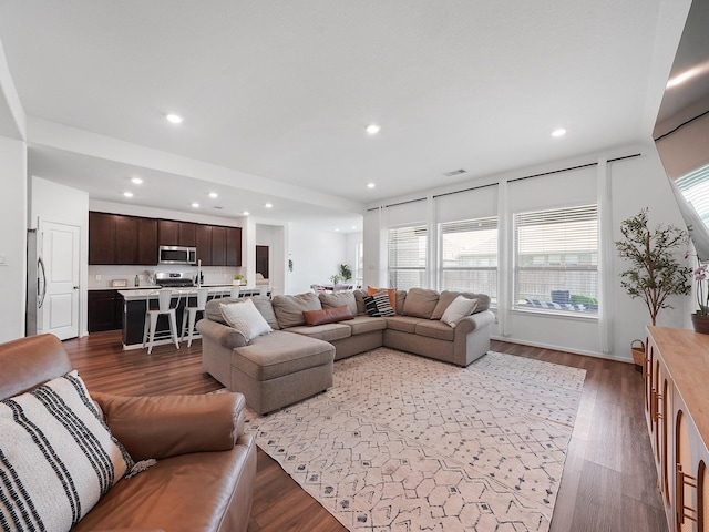 18925 Lazzaro Springs Dr, New Caney, TX 77357 - living room with wood finished floors and recessed lighting