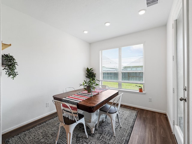 18925 Lazzaro Springs Dr, New Caney, TX 77357 - dining space featuring dark wood finished floors, baseboards, and recessed lighting