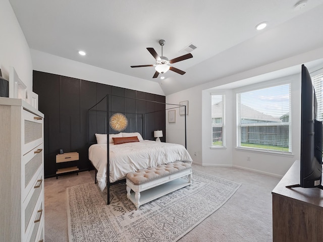 18925 Lazzaro Springs Dr, New Caney, TX 77357 - bedroom featuring light colored carpet, a ceiling fan, baseboards, recessed lighting, and lofted ceiling