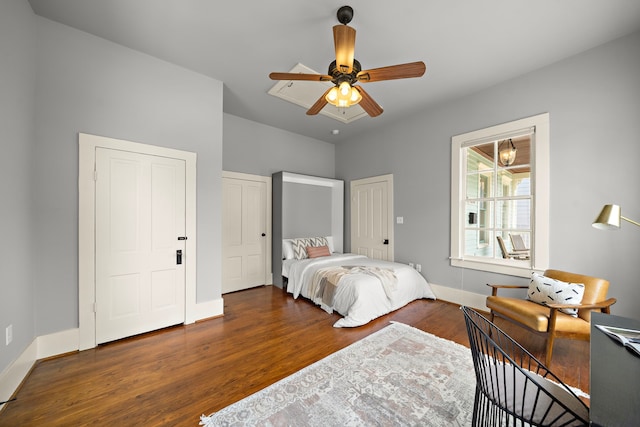 1610 Crockett St, Houston, TX 77007 - bedroom with wood finished floors, baseboards, ceiling fan, and multiple closets