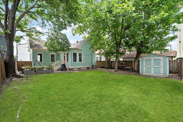 1610 Crockett St, Houston, TX 77007 - rear view of house featuring central air condition unit and roof with shingles