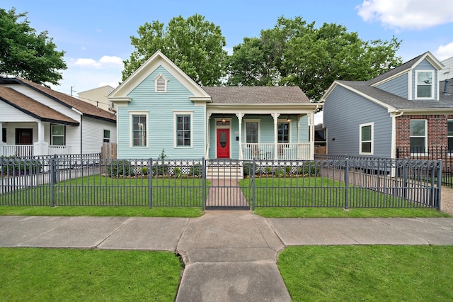 1610 Crockett St, Houston, TX 77007 - view of front facade with covered porch and a gate