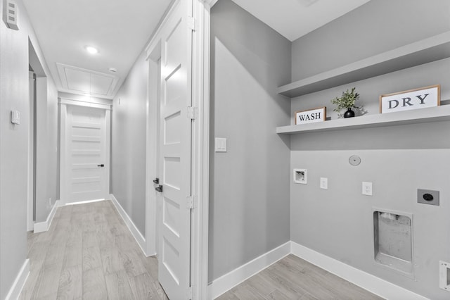 7926 Tate St, Houston, TX 77028 - clothes washing area featuring hookup for an electric dryer, attic access, gas dryer hookup, light wood finished floors, and hookup for a washing machine