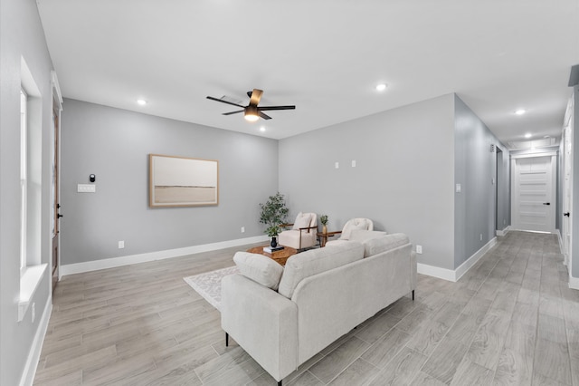 7926 Tate St, Houston, TX 77028 - living area featuring a ceiling fan, light wood finished floors, recessed lighting, and baseboards