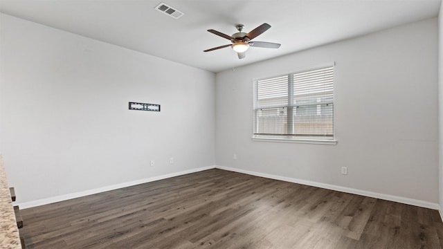 22002 Sovereign Heights Ln, Houston, TX 77073 - empty room with ceiling fan, dark wood-style flooring, and baseboards