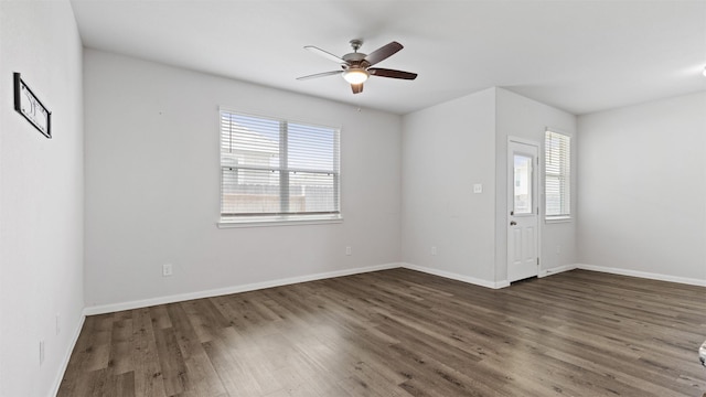 22002 Sovereign Heights Ln, Houston, TX 77073 - spare room featuring wood finished floors, a ceiling fan, and baseboards