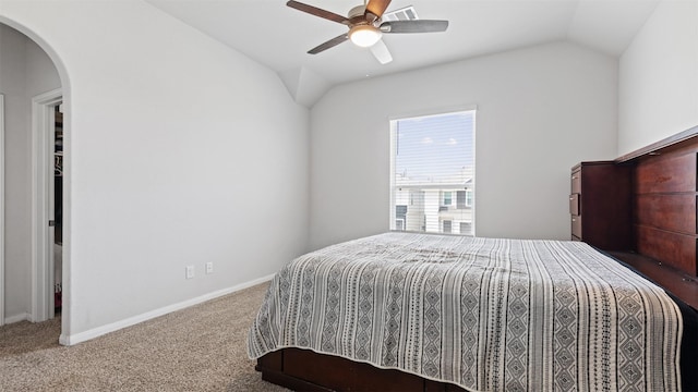 22002 Sovereign Heights Ln, Houston, TX 77073 - carpeted bedroom featuring vaulted ceiling, arched walkways, baseboards, and ceiling fan