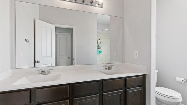 22002 Sovereign Heights Ln, Houston, TX 77073 - full bathroom featuring double vanity and toilet