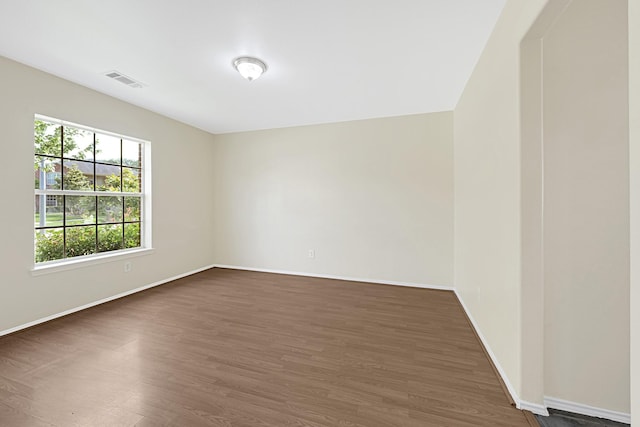 4814 Winding Timbers Ct, Humble, TX 77346 - unfurnished room featuring dark wood-style floors and baseboards