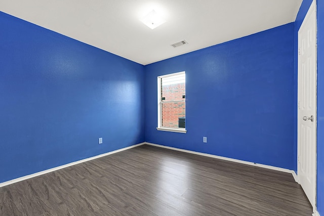 4814 Winding Timbers Ct, Humble, TX 77346 - unfurnished room featuring dark wood-style floors and baseboards