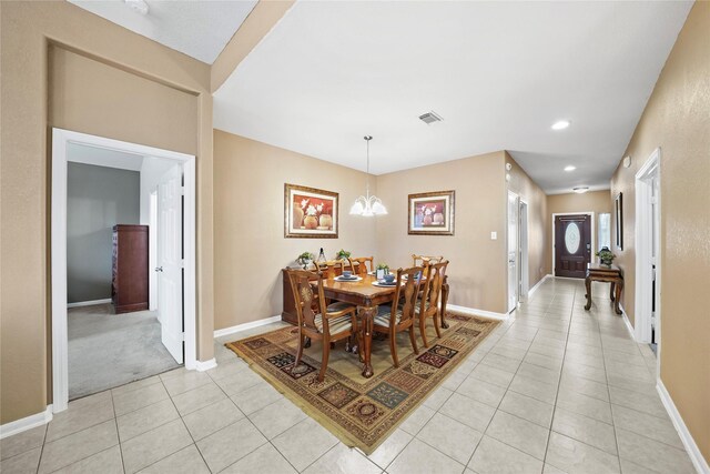 8630 Kirksage Dr, Houston, TX 77089 - dining room featuring light tile patterned floors, a chandelier, baseboards, and recessed lighting