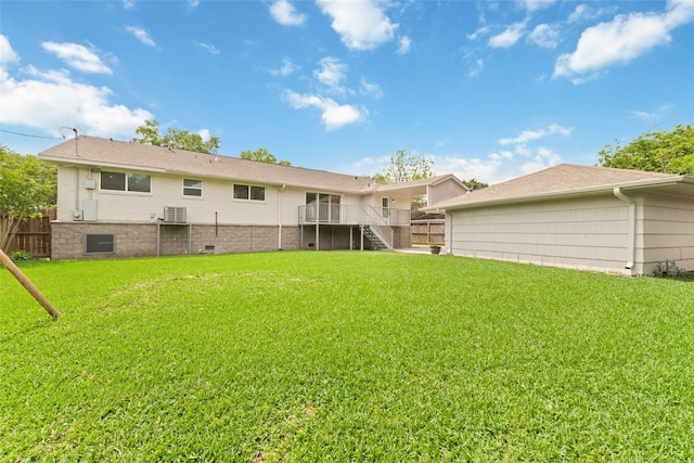 5006 Lymbar Dr, Houston, TX 77096 - rear view of property featuring stairway and central air condition unit