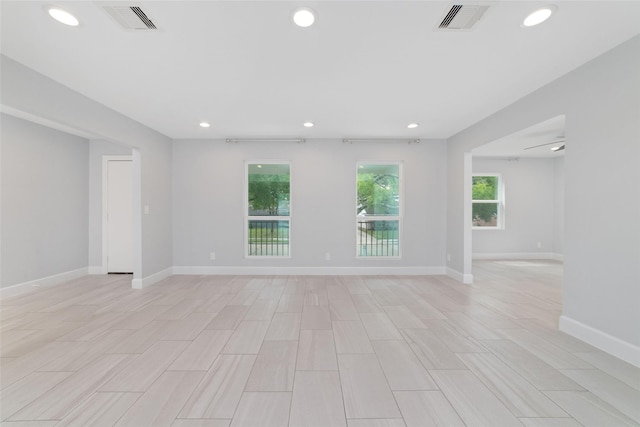 5006 Lymbar Dr, Houston, TX 77096 - unfurnished room with recessed lighting, baseboards, and light wood-style flooring