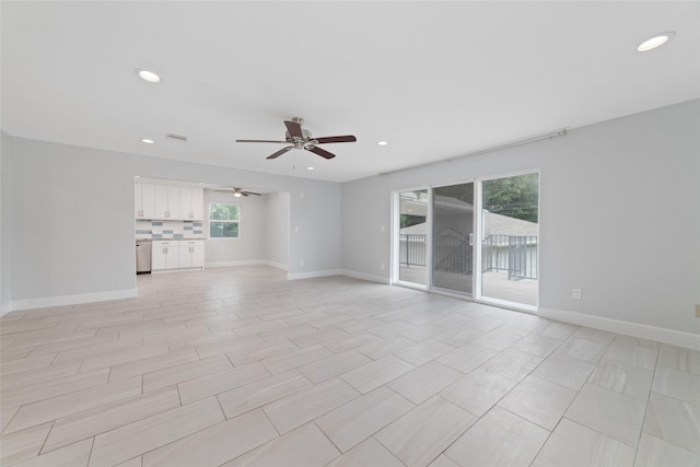 5006 Lymbar Dr, Houston, TX 77096 - unfurnished living room featuring a ceiling fan, recessed lighting, and baseboards