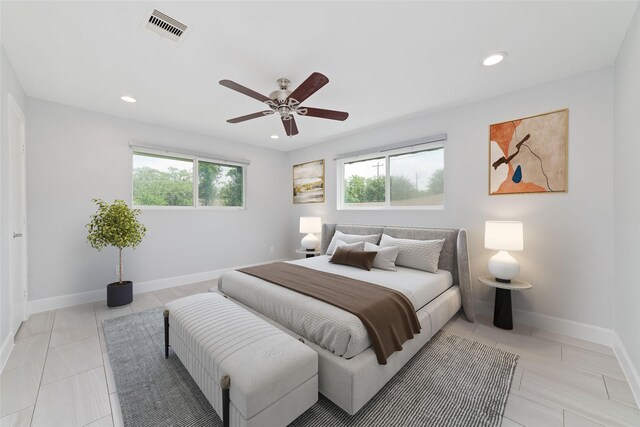 5006 Lymbar Dr, Houston, TX 77096 - bedroom with multiple windows, recessed lighting, baseboards, and a ceiling fan