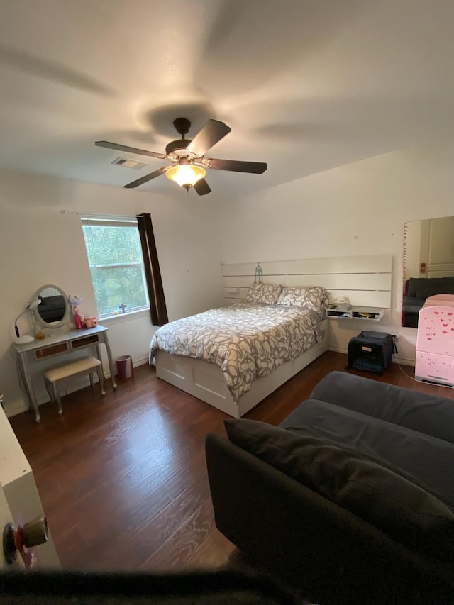 195 Rim Rock Rd, Onalaska, TX 77360 - bedroom with wood finished floors and ceiling fan