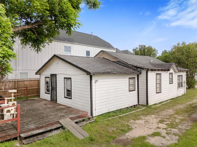 4110 Buck St, Houston, TX 77020 - rear view of property with a deck and a shingled roof