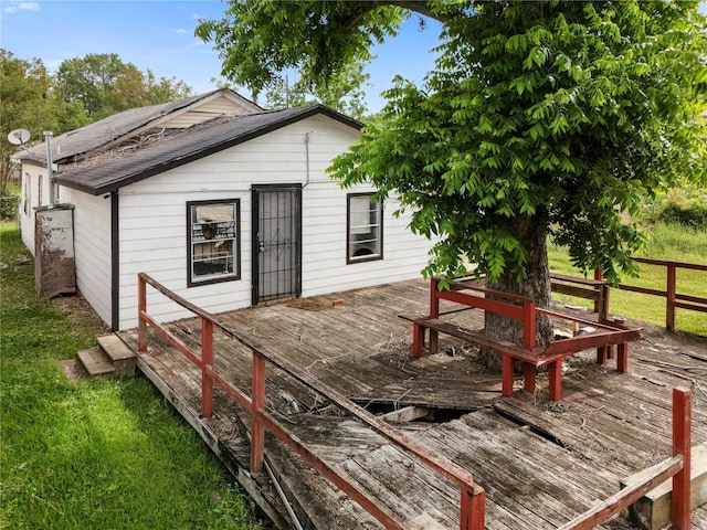 4110 Buck St, Houston, TX 77020 - wooden deck featuring a lawn