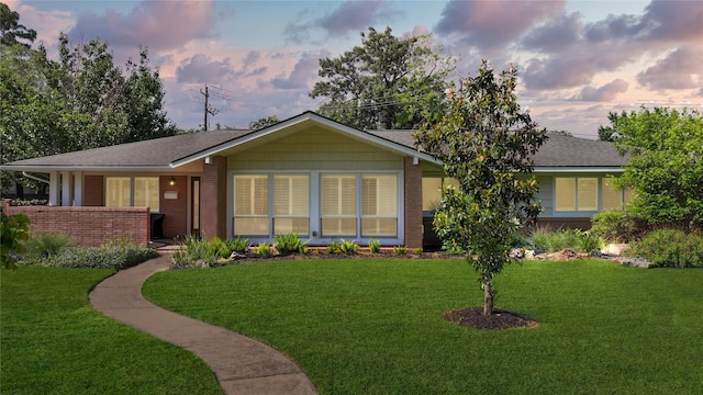 7222 Hartland Ave, Houston, TX 77055 - single story home with a yard, brick siding, and roof with shingles