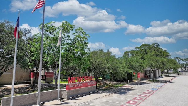 7222 Hartland Ave, Houston, TX 77055 - view of asphalt road featuring traffic signs
