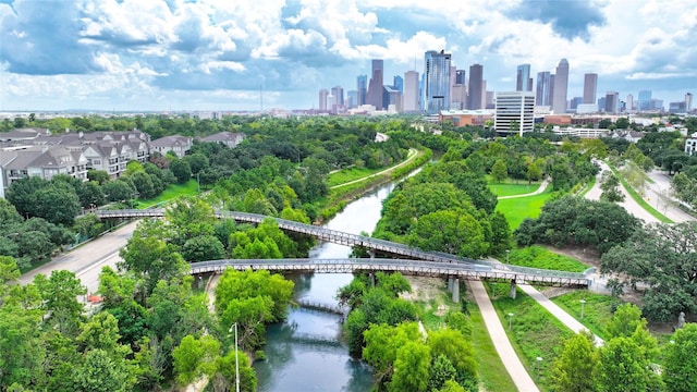 7222 Hartland Ave, Houston, TX 77055 - bird's eye view of a view of skyline, a notable bridge, a tree filled landscape, and a nearby body of water