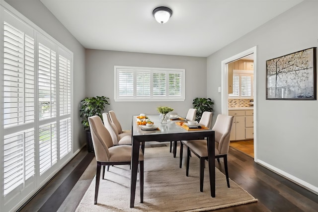 7222 Hartland Ave, Houston, TX 77055 - dining space with dark wood-style flooring and baseboards
