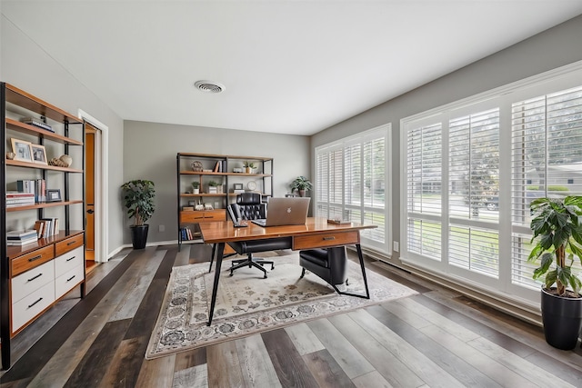 7222 Hartland Ave, Houston, TX 77055 - office area with healthy amount of natural light and dark wood-style flooring