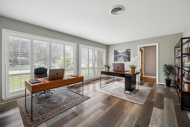 7222 Hartland Ave, Houston, TX 77055 - office featuring plenty of natural light, wood finished floors, and baseboards